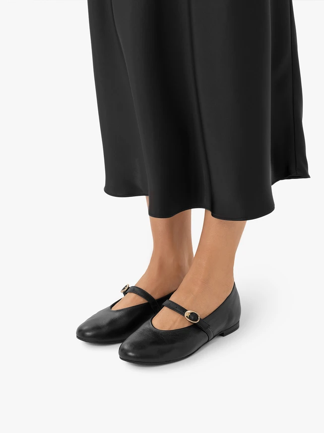 Schwarze Riemchen-Ballerinas