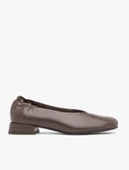 Brown pumps on a block with a square nose