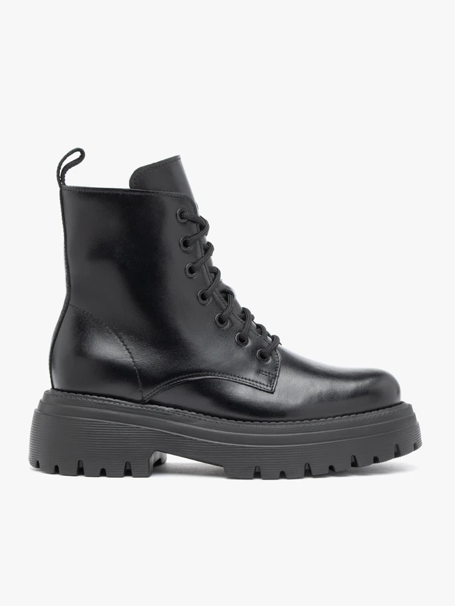 Black hiking boots with a thicker sole