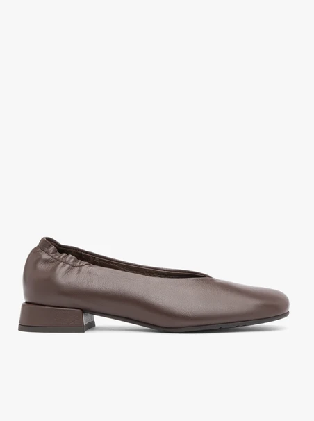 Brown pumps on a block with a square nose