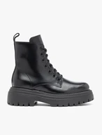 Black hiking boots with a thicker sole