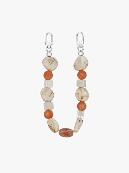 Beaded keychain in shades of pink and beige