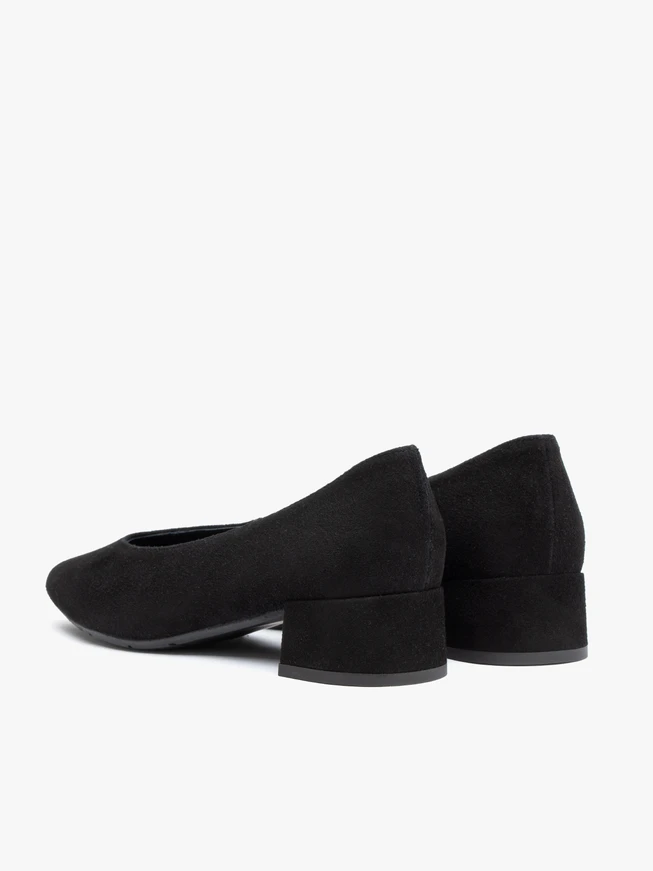 Black velour pumps on a low post