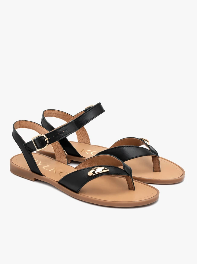 Schwarze Flip Flops mit Verzierung