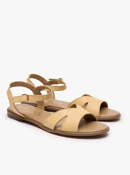 Flache Sandalen aus gelbem Leder