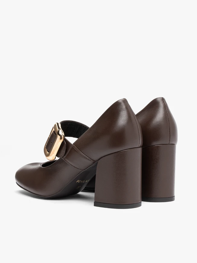 Brown pumps with a striking buckle