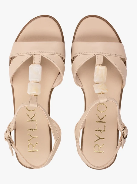 Cremefarbene flache Sandalen mit Verzierung