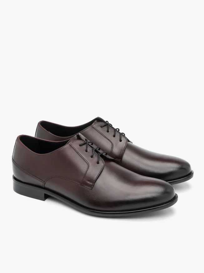 Kastanienbraune formelle Schuhe