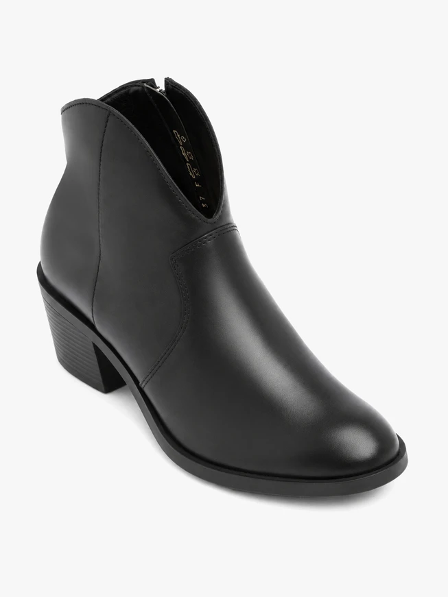 Black cowboy-style ankle boots