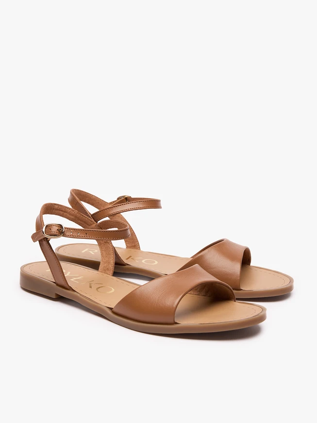 Rote flache Sandalen