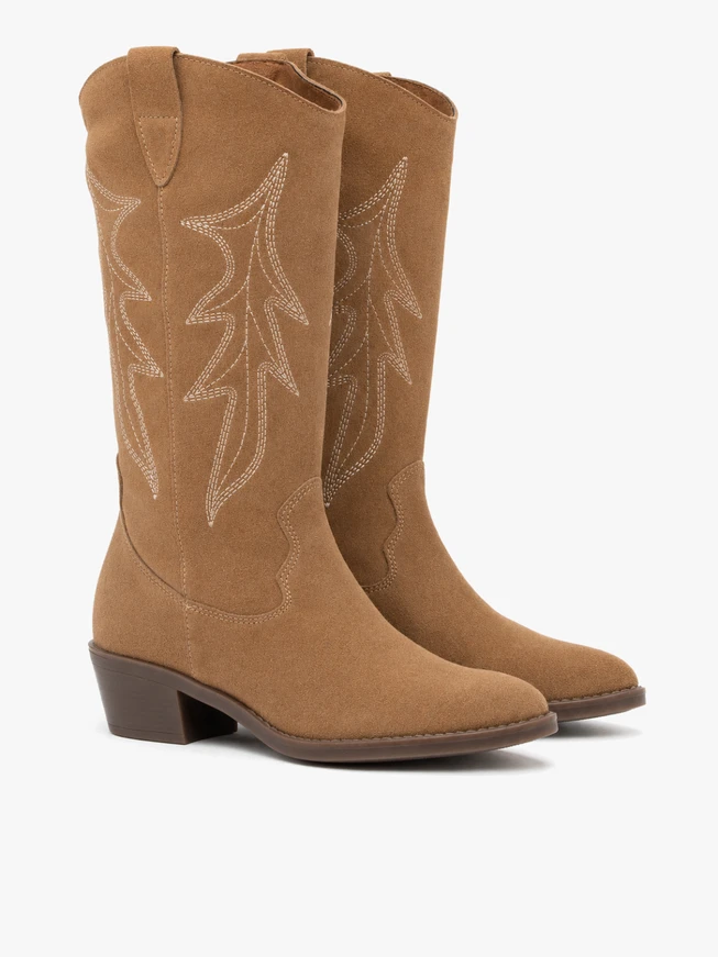 Beige cowboy boots with stitching