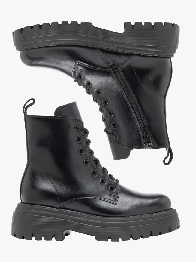 Black hiking boots with a thicker sole