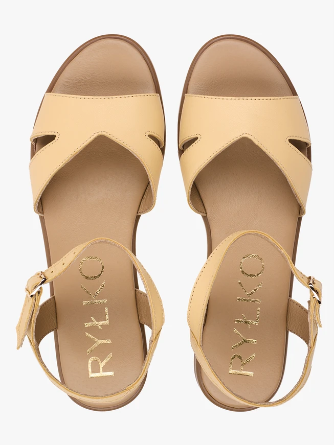 Flache Sandalen aus gelbem Leder