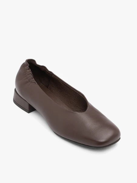 Brown pumps on a block with a square nose