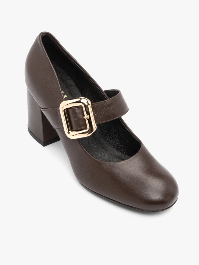 Brown pumps with a striking buckle