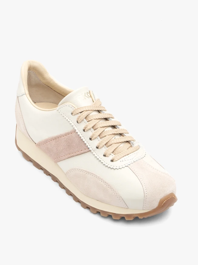 Cremefarbene Sportschuhe mit beigem Riemen