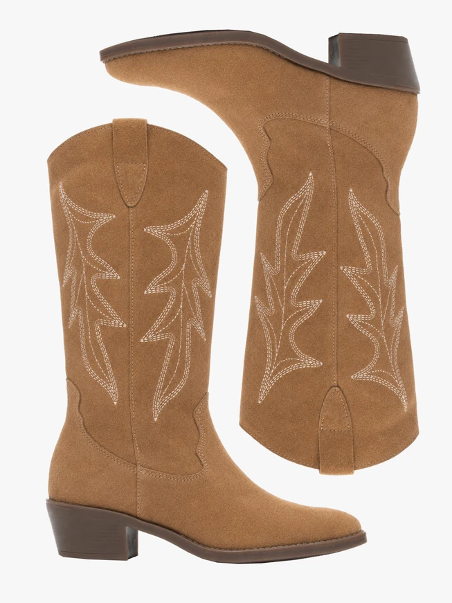 Beige cowboy boots with stitching