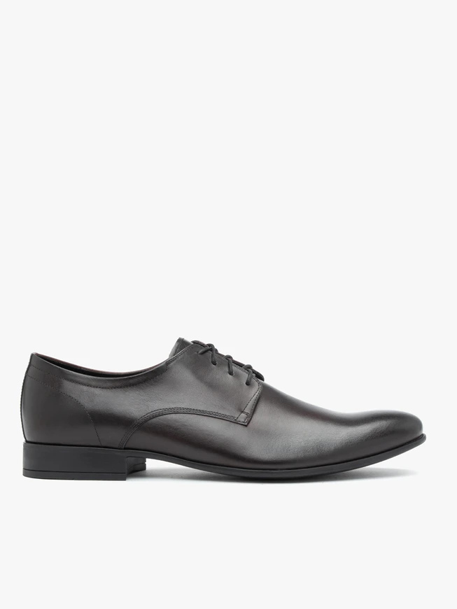 Kastanienbraune formelle Schuhe