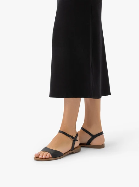 Schwarze flache Sandalen
