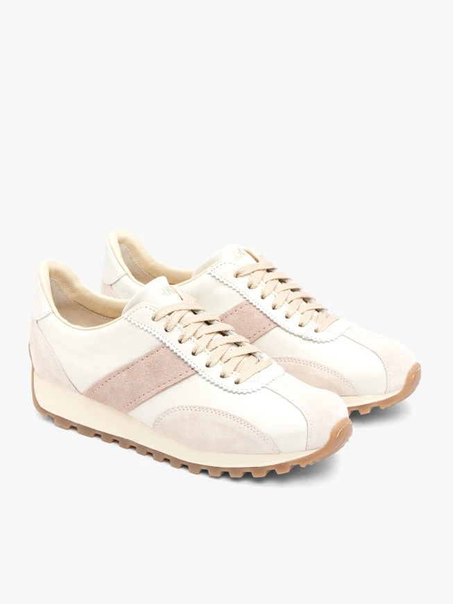 Cremefarbene Sportschuhe mit beigem Riemen