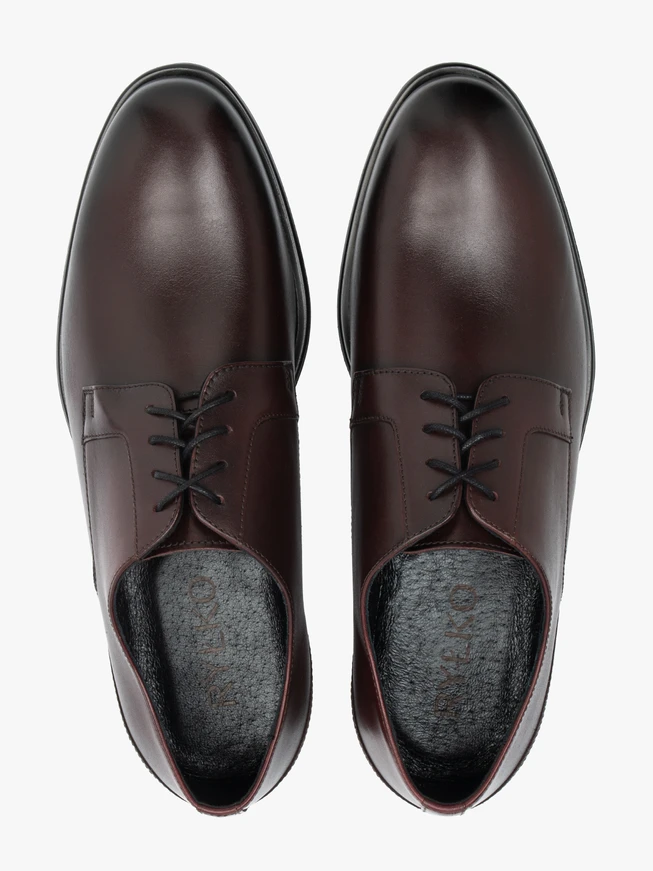 Kastanienbraune formelle Schuhe