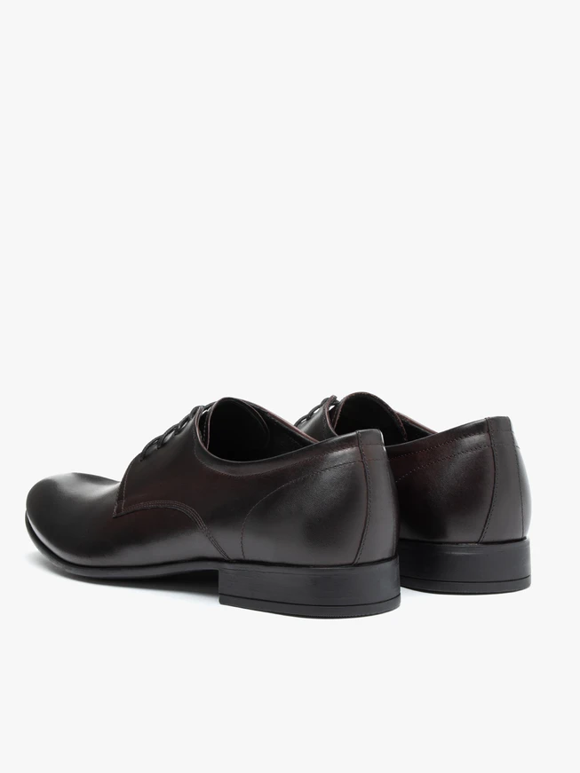 Kastanienbraune formelle Schuhe