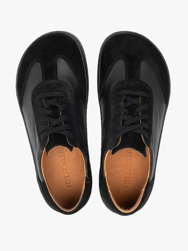 Schwarze Halbstiefel aus genarbtem Leder und Velours