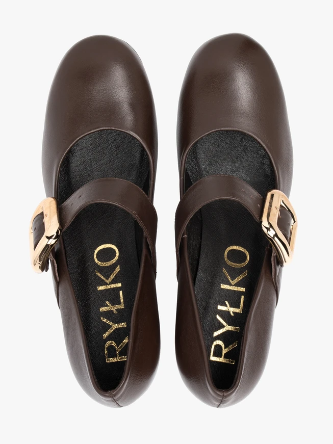 Brown pumps with a striking buckle