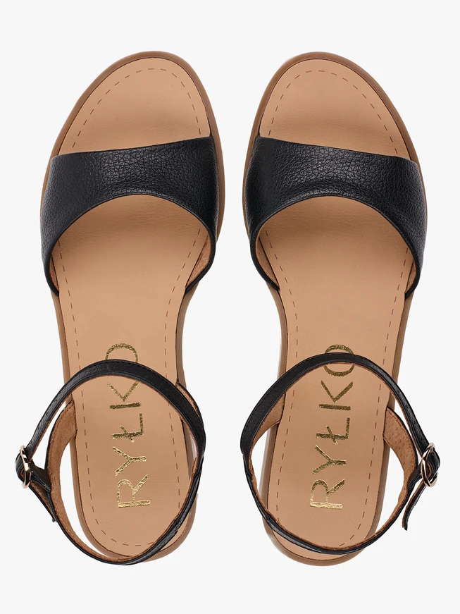 Schwarze flache Sandalen