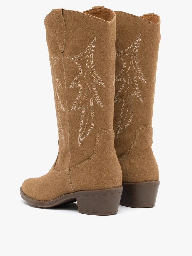 Beige cowboy boots with stitching