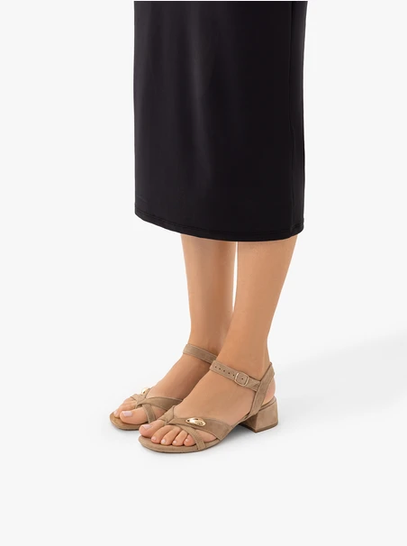 Light brown low heel flip flops with embellishment