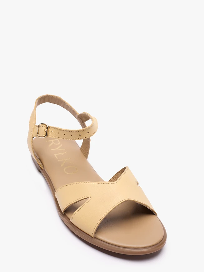 Flache Sandalen aus gelbem Leder