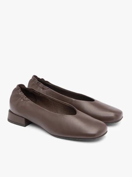 Brown pumps on a block with a square nose