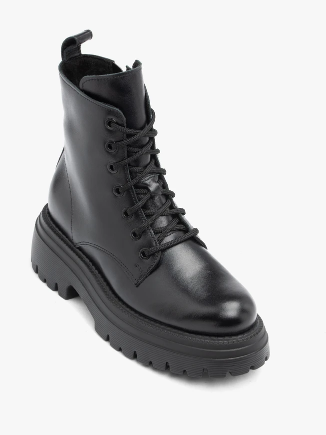 Black hiking boots with a thicker sole