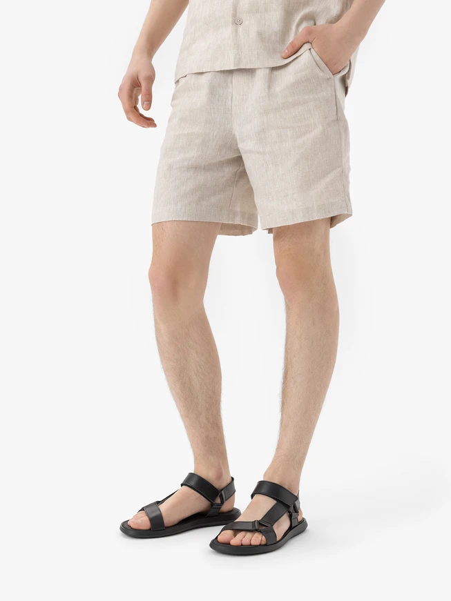 Schwarze Sandalen aus genarbtem Leder