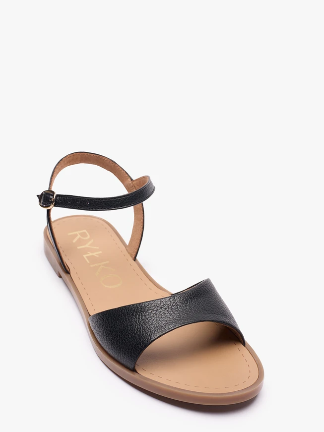 Schwarze flache Sandalen