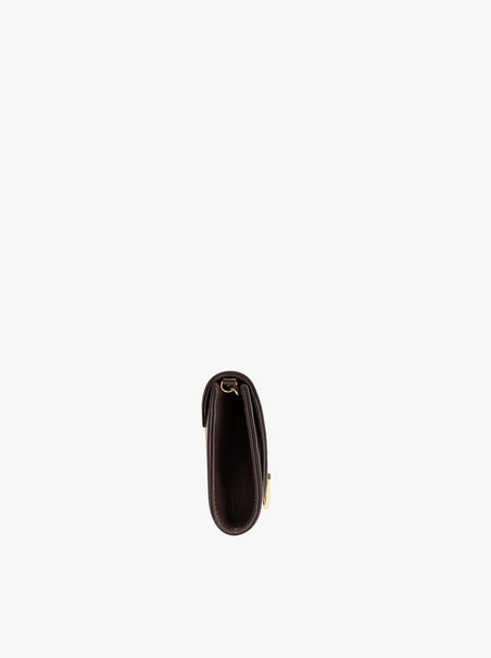 Brown clutch bag with a chain