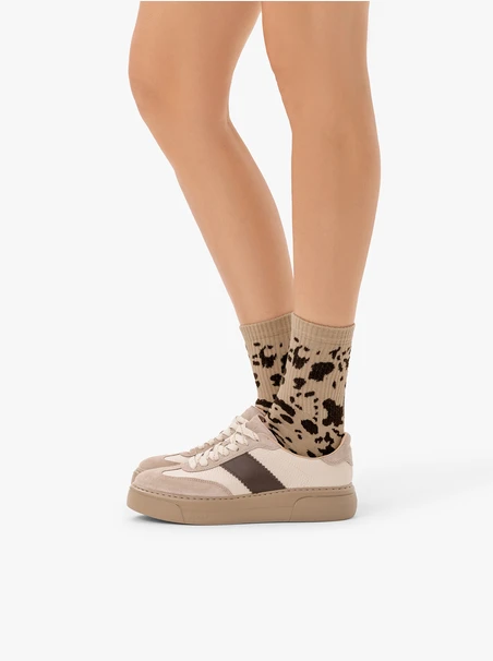 Socks in cow patches