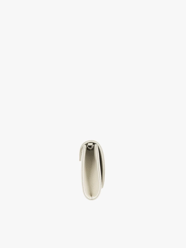 Cream leather clutch bag with chain