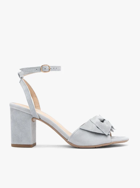 Light blue heeled sandals with detachable bow
