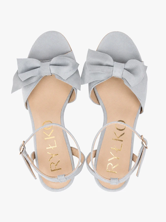 Light blue heeled sandals with detachable bow