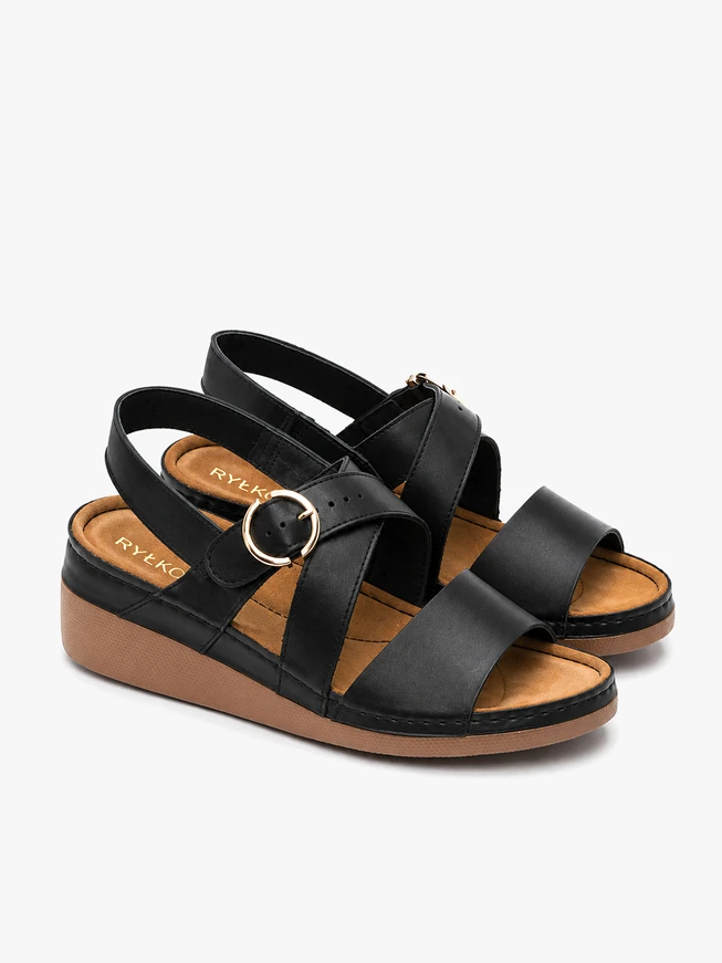 Black sandals on a low heel