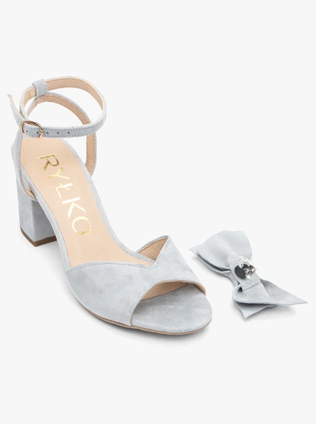 Light blue heeled sandals with detachable bow