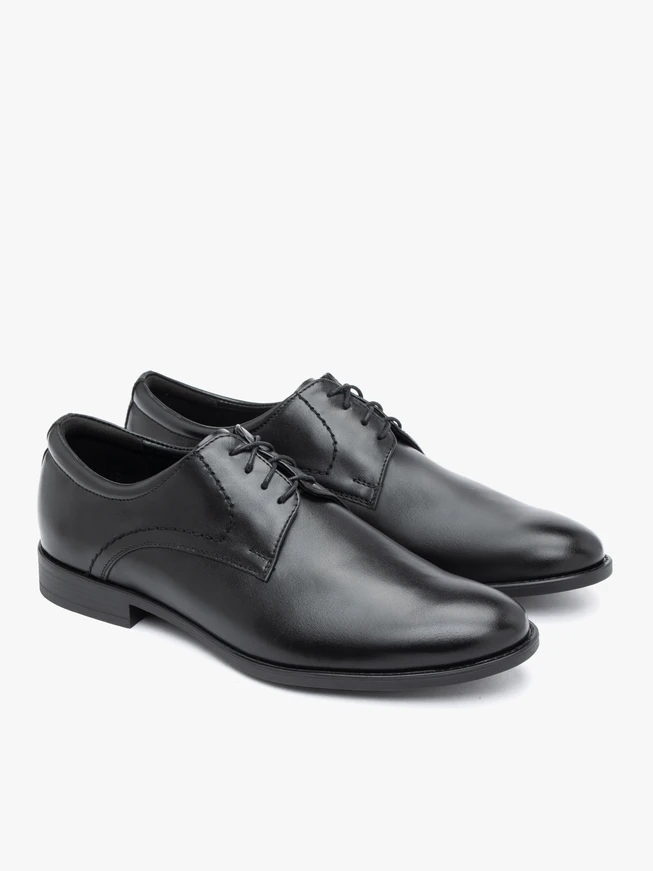 Formelle Schuhe aus schwarzem Leder