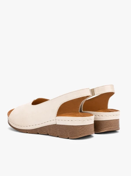 Cream-colored full-grain leather sandals