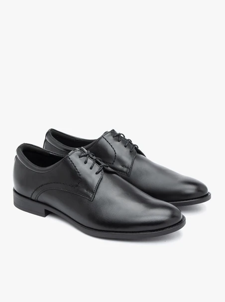 Formelle Schuhe aus schwarzem Leder