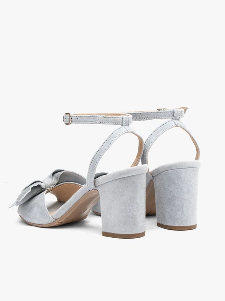 Light blue heeled sandals with detachable bow