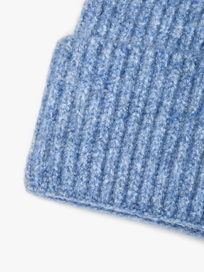 Blue hat with wool accents