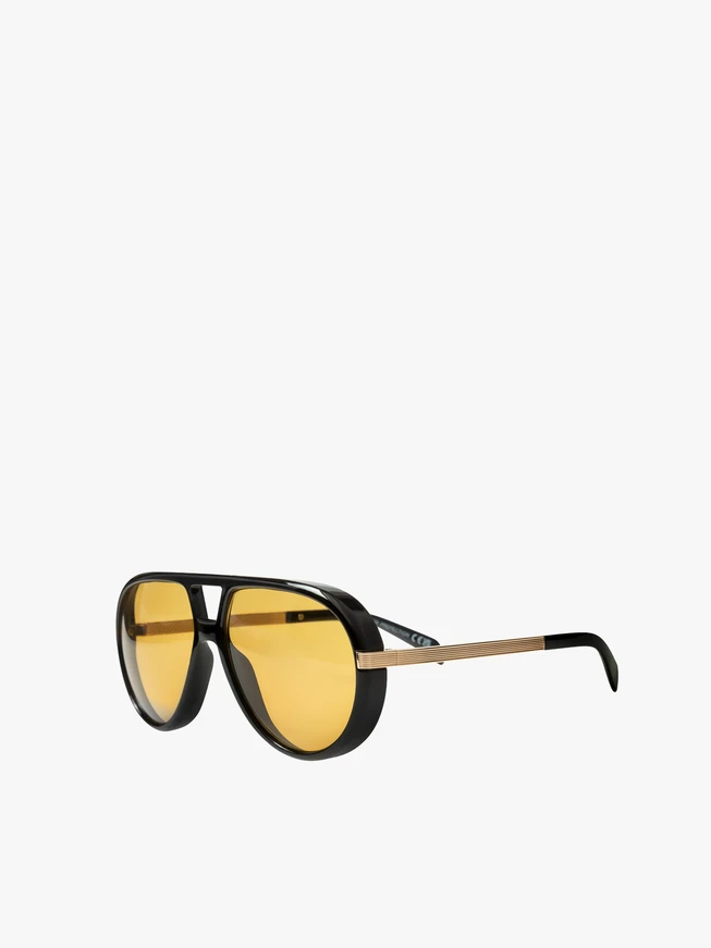 Black unisex aviator glasses with yellow lenses