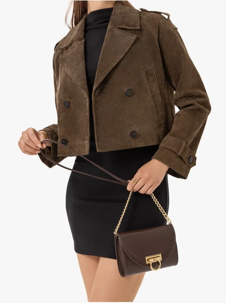 Brown clutch bag with a chain
